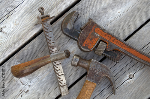 Old Vintage Tools on Weathered Wood