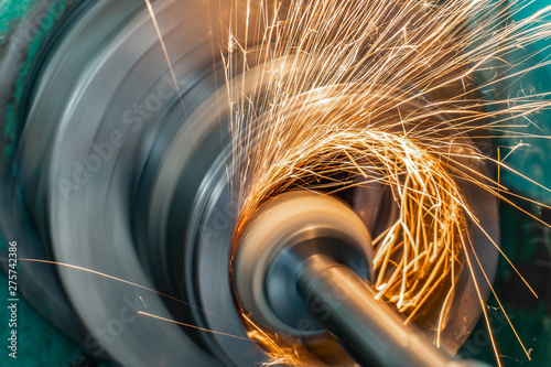 Metal grinding, internal grinding with an abrasive wheel on a high-speed spindle of a circular grinding machine. photo