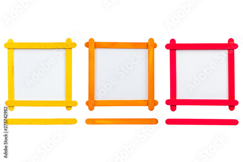 blank photo frame made of color popsicle wood sticks isolated on white background