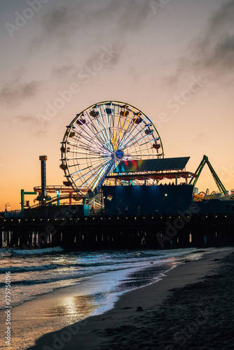 The Santa Monica pier at sunset, in Los Angeles, California © jonbilous