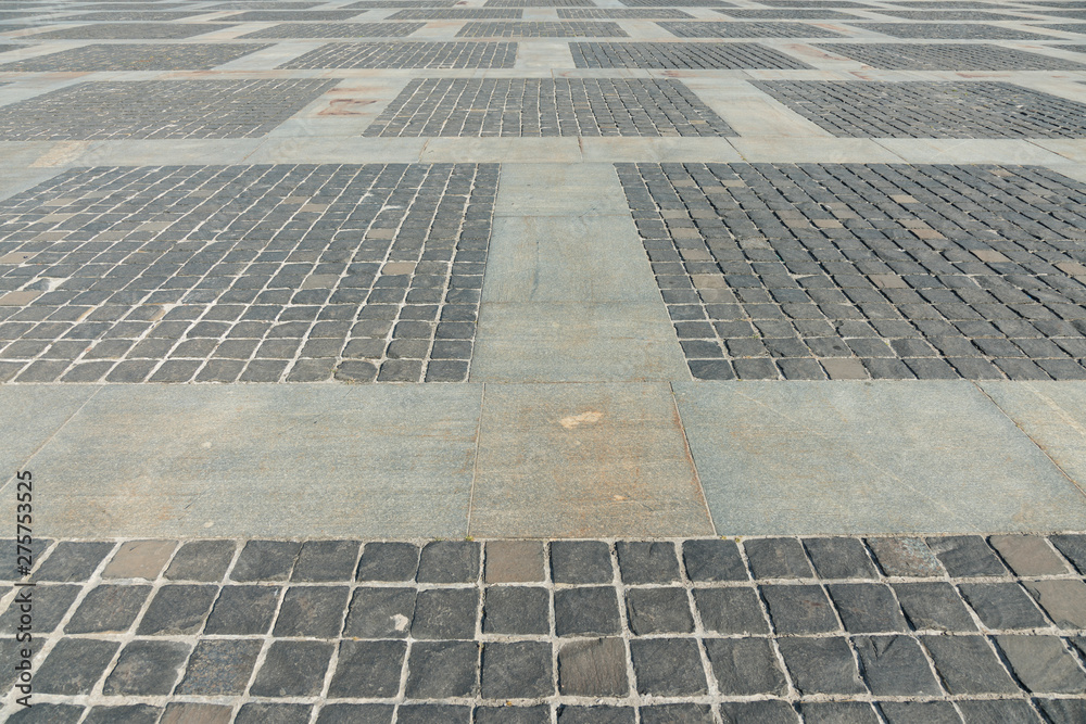 Fototapeta premium Stone Square. Old road of stones. Gray stone background
