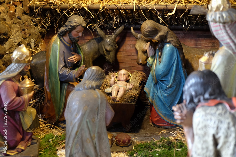Fototapeta premium Nativity scene, creche, or crib, birth of Jesus in Barmherzigenkirche church in Graz, Styria, Austria