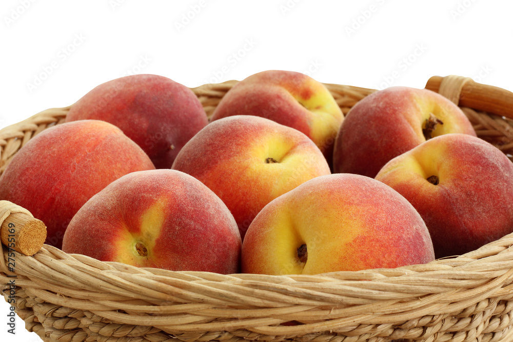 basket with peaches isolated on white background basket with peaches isolated on white background