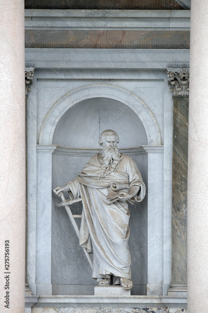 Saint Paul statue in front of the basilica of Saint Paul Outside the Walls, Rome, Italy 