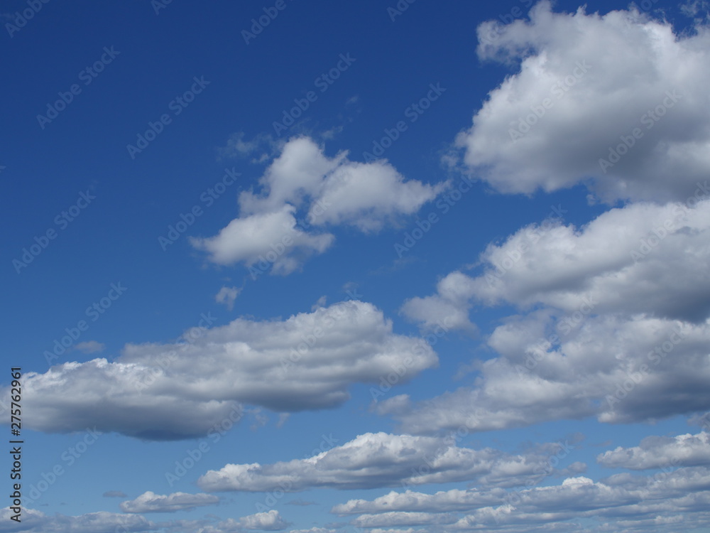 fluffy cumulus clouds in blue sky skyscape fluffy cumulus clouds in blue sky skyscape