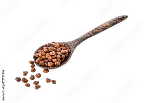 Nuts seed in wood spoon on white background