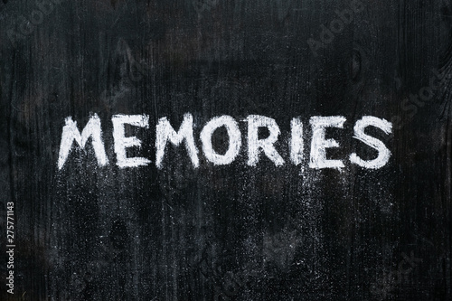 Vászonkép Mental issues concept: hand written word memories crumbling on black wood background