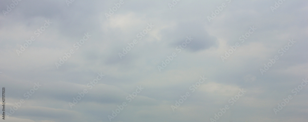 Dark cloudy sky background with stormy bad weather cloudscape 