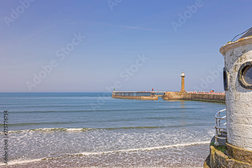 Whitby beach with roundhouse and pier. © Jack Cousin