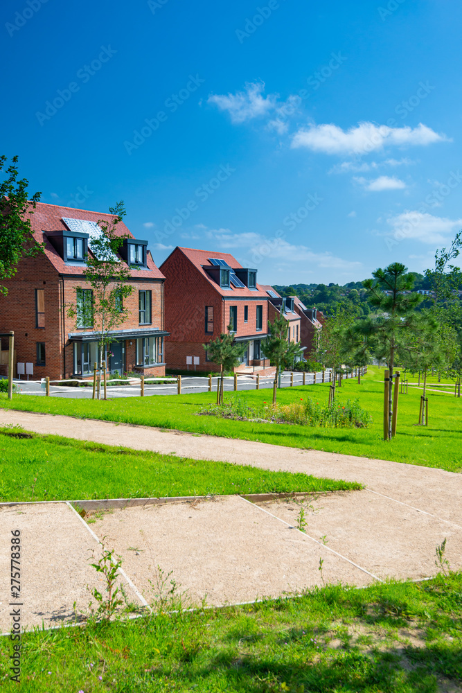 New English Estate with blue sky New English Estate with blue sky
