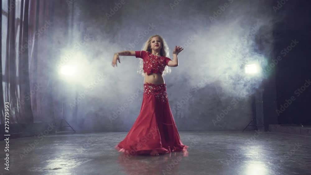 Caucasian children girl dancing belly dance Caucasian children girl dancing belly dance