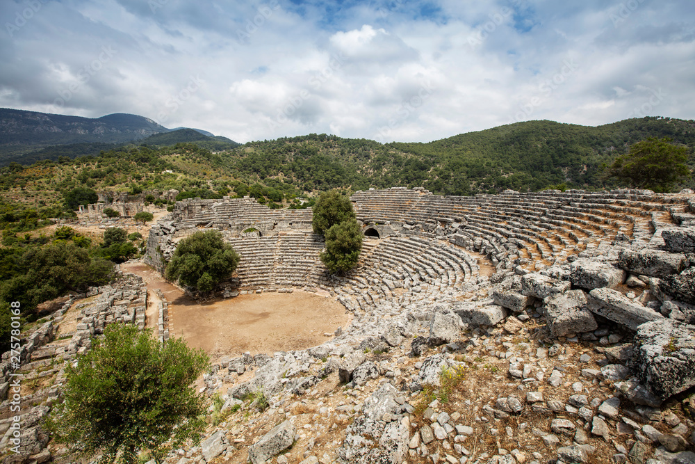 Ancient city of Kaunos, Dalyan valley, Turkey. Kaunos (Latin: Caunus) was a city of ancient Caria and in Anatolia, a few km west of the modern town of Dalyan, Muğla Province, Turkey.