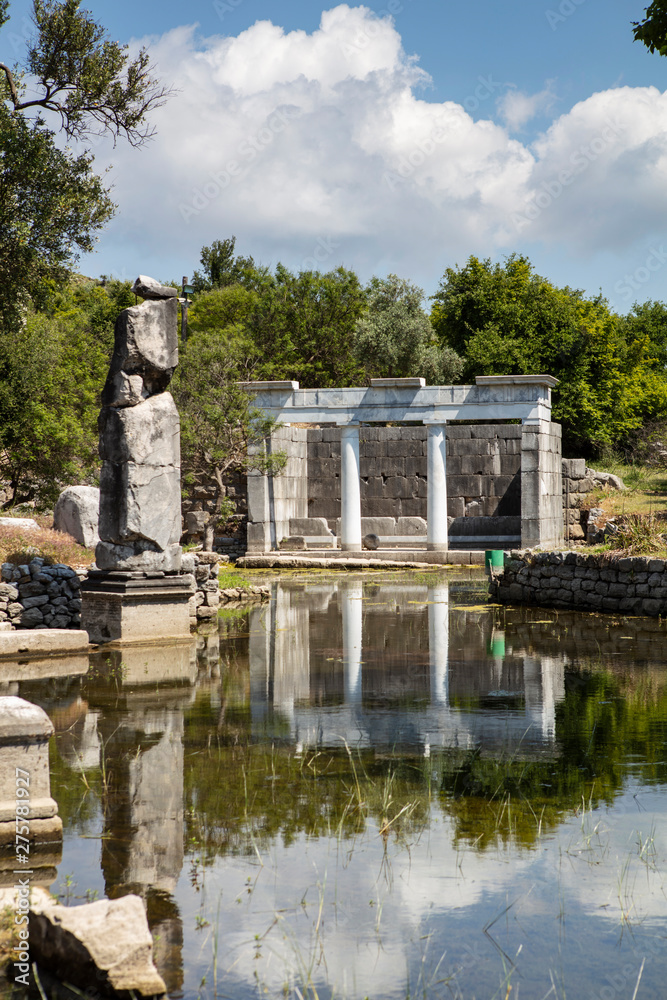 Ancient city of Kaunos, Dalyan valley, Turkey. Kaunos (Latin: Caunus) was a city of ancient Caria and in Anatolia, a few km west of the modern town of Dalyan, Muğla Province, Turkey.