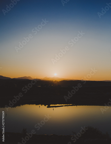  Sun setting over the mountain seen from the riverbed © Luica_MPM