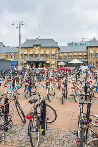 Parked bicycles at the railway station in Gothenburg, Sweden photo