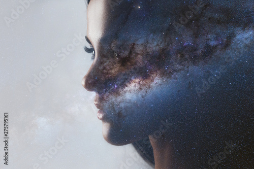 The universe inside us, the profile of a young woman and space, the effect of double exposure. scientific concept. The brain and creativity. Elements of this image furnished by NASA