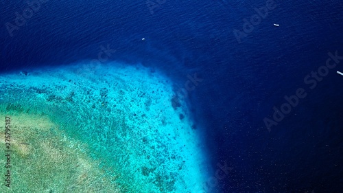 Aerial view of Gili island's reefs and corals near Bali, Indonesia