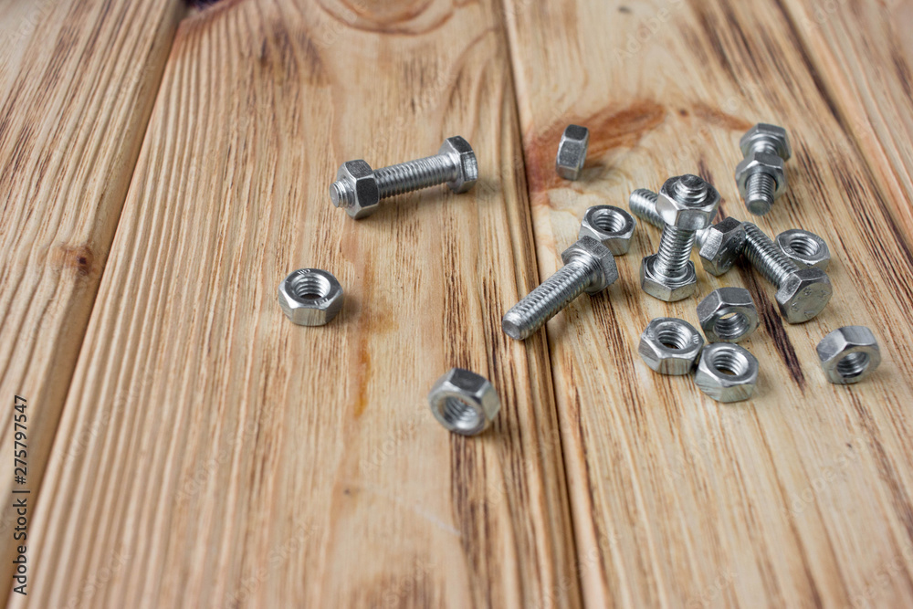 female screw helix on wooden background female screw helix on wooden background
