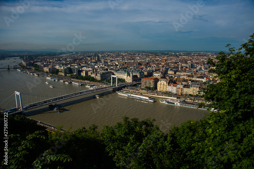 Budapest, Hungary: Buda and Pest connected by Erzsebet hid or Elisabeth Bridge in the evening. Editorial Image of Budapest view photo