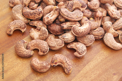 Cashew nuts on wooden board