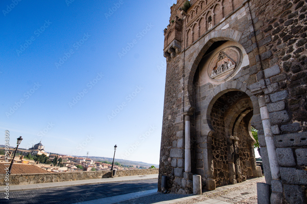 external view of puerta del sol aka. del sol gate at toledo, spain