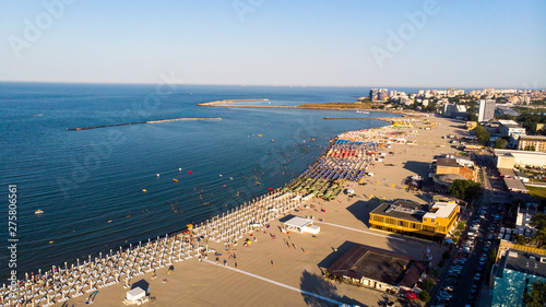 Aerial view of beach in Mamaia, Constanta, popular tourist place and resort on black sea in a Romania. At one side of this place is located lake, and at other side is a Black Sea.