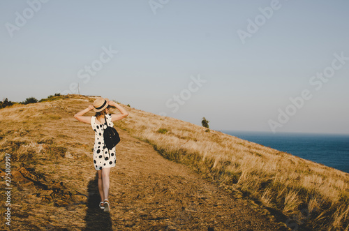 young woman walking in Sevan island photo