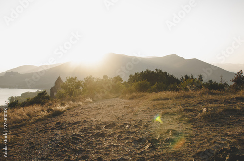 Sevan island while sunset in Armenia photo