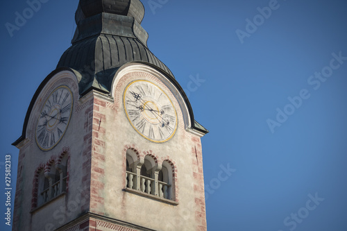 Clock tower of Catholic church which is the landmark building in Lesce (country side city), Slovenia. Selected focus photo