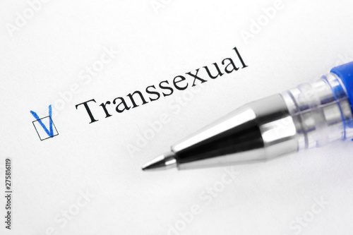 Transsexual. Filling in the questionnaire, documents. The checkboxes are filled with a black pen on a white background. Questionnaire, survey.