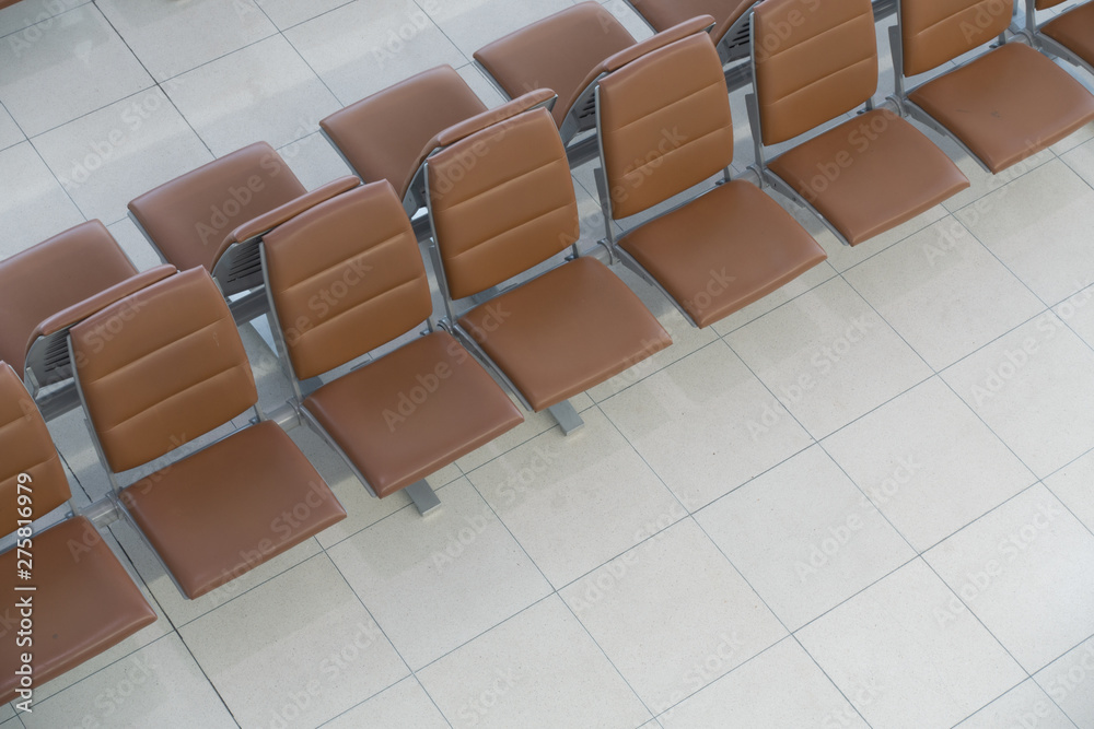 Fototapeta premium Seats inside the passenger hall at the Airport is empty space.