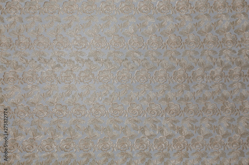 Beautiful white fabric with floral pattern and textile texture background