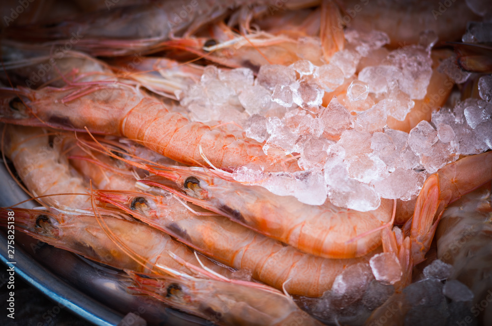 fresh seafood within the fish market in Spain - octopus, shells, shrimps, fish, oysters, lobster fresh seafood within the fish market in Spain - octopus, shells, shrimps, fish, oysters, lobster