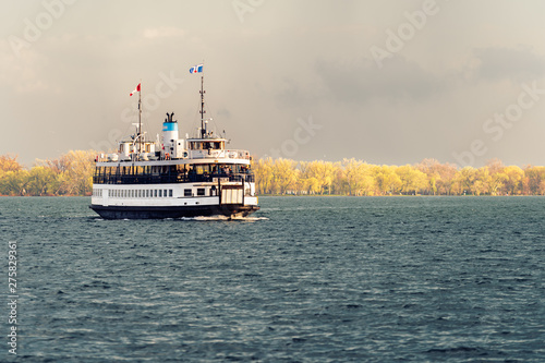 Photography A passenger ferry sails across Toronto harbour after a storm