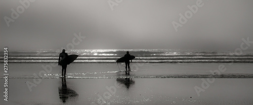 Surfers in Trinidad, California photo