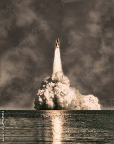 Fotografija Flying rocket. The elements of this image furnished by NASA.