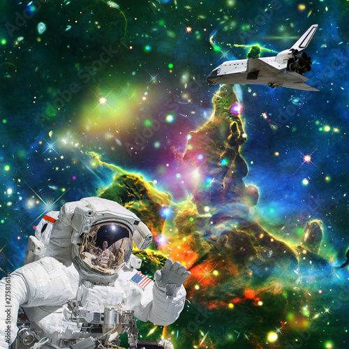 Fototapeta Naklejka Na Ścianę i Meble -  Astronaut in outer space. Shuttle on the backdrop. The elements of this image furnished by NASA.