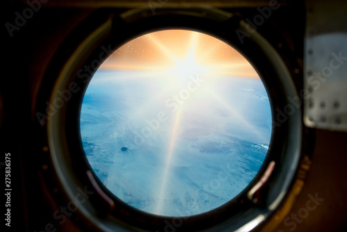 Sunrise  view from spaceship. Elements of this image furnished by NASA.