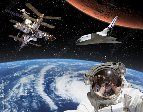 Astronaut  mars and shuttle. The elements of this image furnished by NASA.