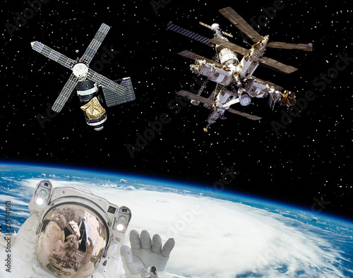 Astronaut and spaceships. The elements of this image furnished by NASA. © wowinside