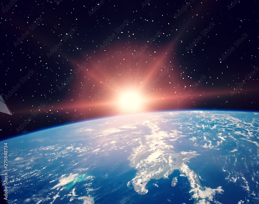 Fototapeta premium Sunflare and the earth from space. The elements of this image furnished by NASA.