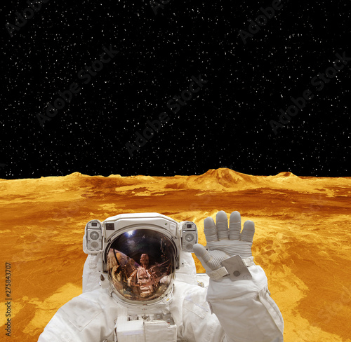 Astronaut posing on the strange extrasolar planet. The elements of this image furnished by NASA. photo