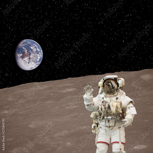Astronaut posing on the moon. The elements of this image furnished by NASA.