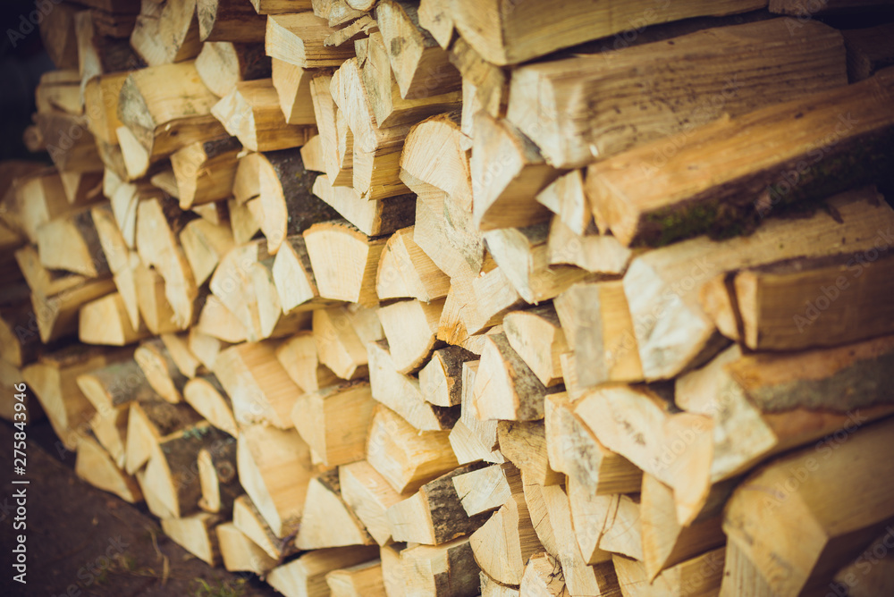 Barbecue firewood. Dry wooden sticks are stacked in a stack.Barbecue firewood. Dry wooden sticks are stacked in a stack. Barbecue firewood. Dry wooden sticks are stacked in a stack.Barbecue firewood. Dry wooden sticks are stacked in a stack.