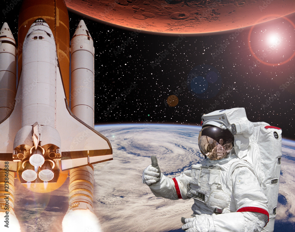 Rocket flies from earth to Mars. Astronaut shows the thumbs-up. Big sun.  The elements of this image furnished by NASA.