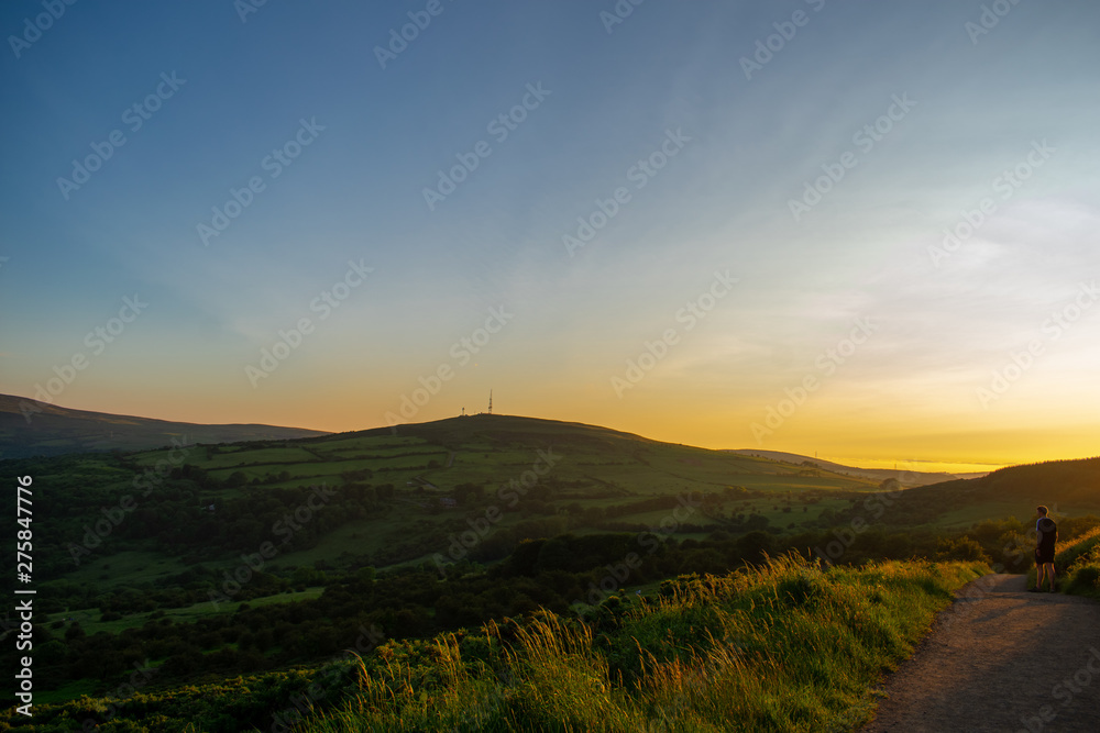 Colorful sunset at Cave Hill Country Park Belfast, Northern Ireland. Aerial view on City and hills 
