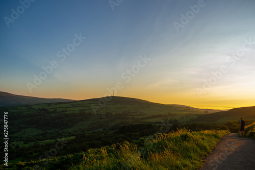 Colorful sunset at Cave Hill Country Park Belfast, Northern Ireland. Aerial view on City and hills 