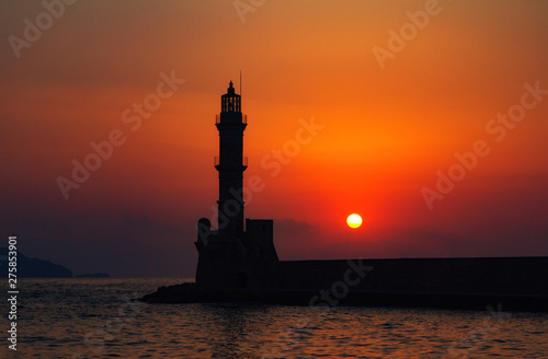 Lighthouse of Chania at summer sunset , Crete , Greece. Travel background