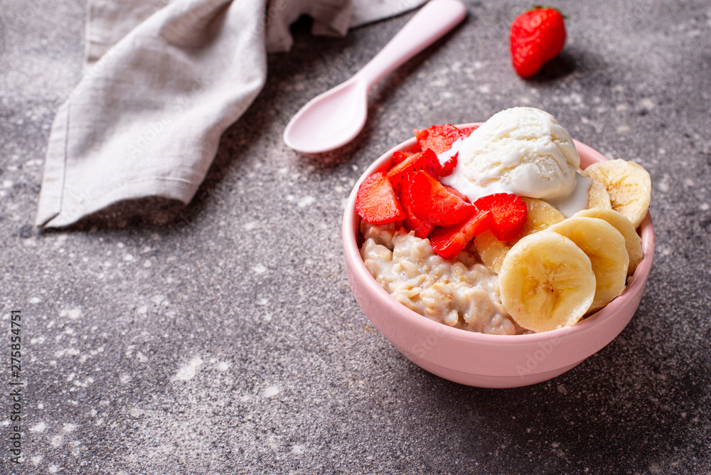 Oatmeal with strawberry, banana and ice cream