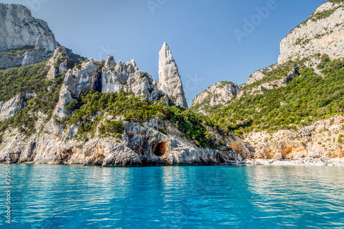 The monolith of Pedra Longa, Baunei, province of Ogliastra, East Sardinia, Italy. The rocky spire which rises majestically out of the sea. Holidays in Sardinia. photo